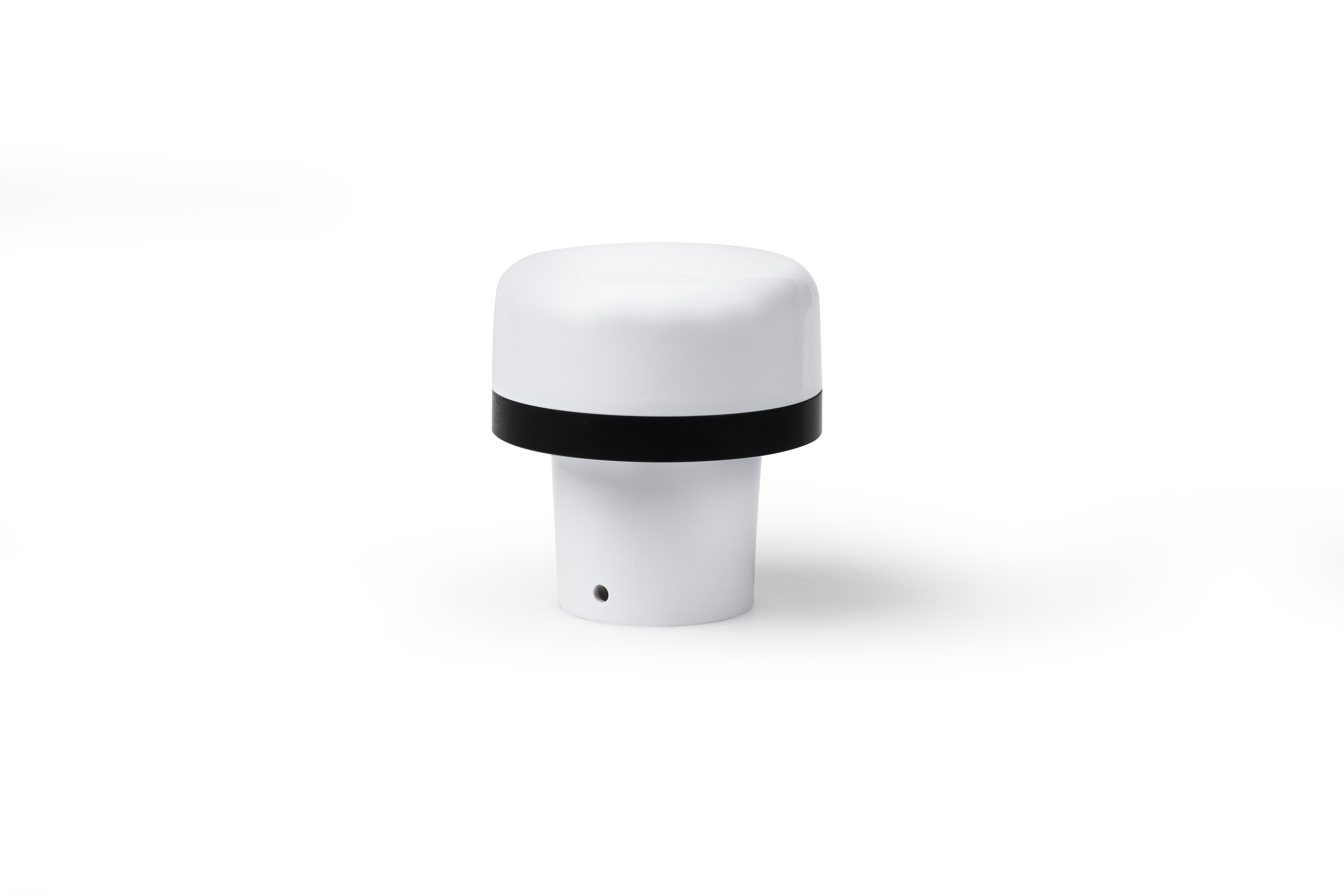 person using crane to move industrial gear box in engineering factory