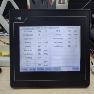 person using crane to move industrial gear box in engineering factory