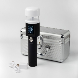 person using crane to move industrial gear box in engineering factory