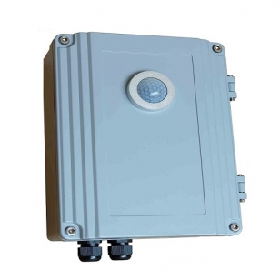 person using crane to move industrial gear box in engineering factory