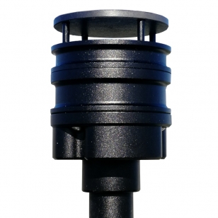 person using crane to move industrial gear box in engineering factory